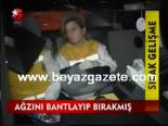Ağzını Bantlayıp Bırakmış