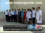 Oğlunun Kollarının Bağışları