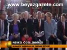 Merkel Ödüllendirdi