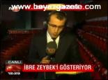 İbre Zeybek'i Gösteriyor