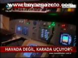 Havada Değil, Karada Uçuyor