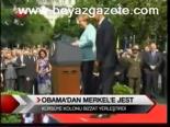 Obama'dan Merkel'e Jest