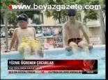 Yüzme Oğrenen Çocuklar
