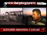 Alevlerin Arasında 2 Çocuk !