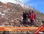 Yaralı dağcıyı hayata taşıdılar... online video izle