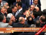 MHP'li vekiller kürsüyü kuşattı