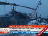 Helikopter sahile indi