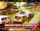 Hırsızın polise saldırdığı an