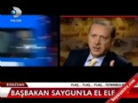 Başbakan Saygun'la el ele  online video izle