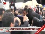 Azize'den gül, Başbakan'dan kartvizit 