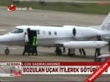 Bozulan uçak itirilerek götürüldü  online video izle