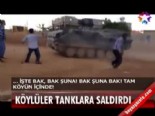 Köylüler tanklara saldırdı 