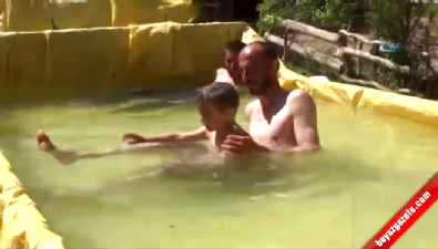 Çocuklarını denize götüremeyince römorku havuza çevirdi  Videosu