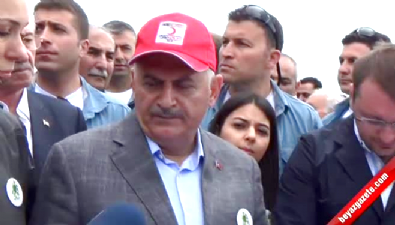 Başbakan Yıldırım, yağmur altında doğa yürüyüşü yaptı 