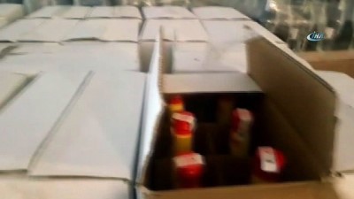  Polisten yılbaşı öncesi sahte içki baskını... 9 bin 293 şişe sahte içki ve üretim yapılan malzemeler ele geçirildi