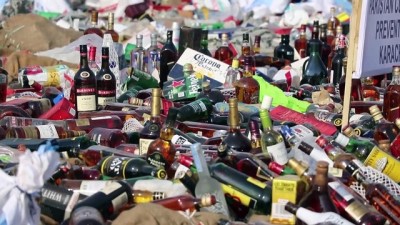 gumruk muhafaza - Dünya Gümrük Günü'nde alkol şişeleri kepçe ve silindirle ezildi - KARAÇİ  Videosu