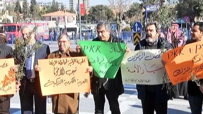  Suriyeliler zeytin dallarıyla miting düzenledi