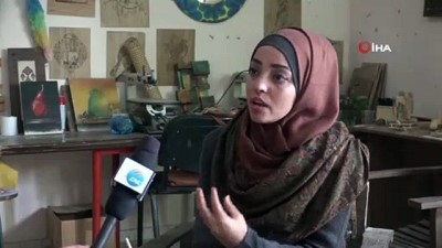 kordon -  - Filistinli Kadın Sanatçı Baharatla Resim Yapıyor  Videosu