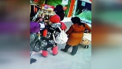 kadin hirsiz -  Bebek arabasından çanta çalan hırsızlar güvenlik kamerasına yakalandı  Videosu