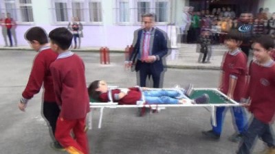 sivil savunma -  Sarıgöl 4 Eylül İlkokulu'nda başarılı tatbikat  Videosu