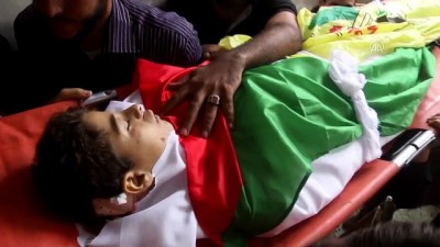 kabristan - Gazze'deki gösterilerde şehit olan 15 yaşındaki Filistinli Azzam'ın cenaze töreni - HAN YUNUS Videosu