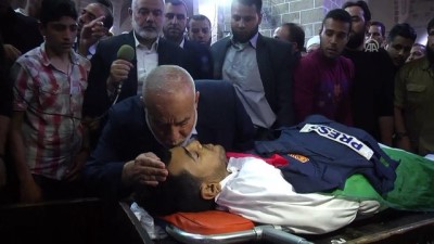 kutsal toprak - İsrail'in şehit ettiği Filistinli gazeteci Murteca'nın cenaze merasimi (2) - Heniye - GAZZE Videosu