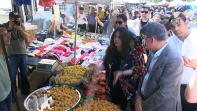 pazar esnafi -  Bakan Sarıeroğlu çocukluğunun pazarında vatandaşlardan oy istedi Videosu
