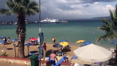 salda - İzmir'de tatilcilere yağmur sürprizi Videosu