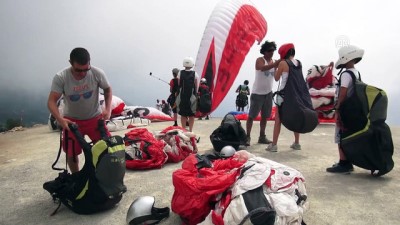 yabanci turist - Bayramda Babadağ'dan 2 bin kişi uçtu - MUĞLA  Videosu