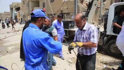 Irak'taki bombalı saldırı - Enkaz kaldırma çalışmaları - BAĞDAT