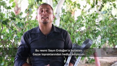 portre -  - Erdoğan’ın portresini Gazze sahiline çizen engelli ressam İHA’ya konuştu
- “Erdoğan Gazze ve Filistin halkının yanında duran tek lider”  Videosu
