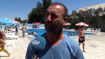 yuzme -  Iğdırlılar sıcaktan havuzlara akın etti  Videosu