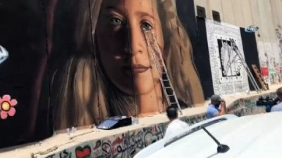 hapishane -  - Filistinli Sanatçılar, Ayrım Duvarı’na “Cesur Kız” Tamimi'nin Resmini Çizdi Videosu