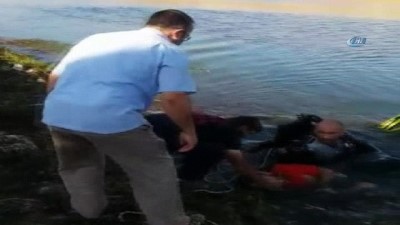 kurtarma ekibi -  Yüzmek için nehre giren genç yoğun bakımda  Videosu