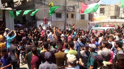 saglik gorevlisi - İsrail askerlerinin şehit ettiği 3 Filistinli son yolculuğuna uğurlandı - REFAH Videosu