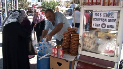 euro -  Simitçiden dolara karşı kampanya...100 dolar bozdurana simit bedava Videosu