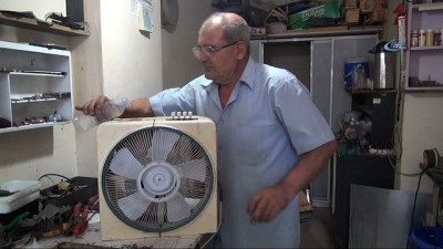marangoz ustasi -  Sıcaktan bunaldı, otomobil radyatörü ile vantilatörü birleştirerek klima yaptı  Videosu