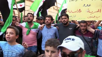 savas sucu - İdlibliler rejimin alıkoyduğu sivillere özgürlük istedi - İDLİB Videosu