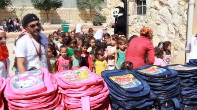 okul cantasi - Suriyelilere yönelik yardımlar - HATAY  Videosu