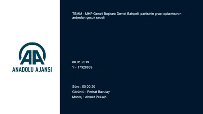 Bahçeli, partisinin grup toplantısının ardından çocuk sevdi - TBMM 