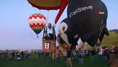 sicak hava balonu -  - Sıcak hava balonları gökyüzünü renklendirdi  Videosu