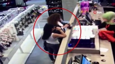  Hırsızlık zanlısı kadın çaldığı telefonlarla yakalandı 