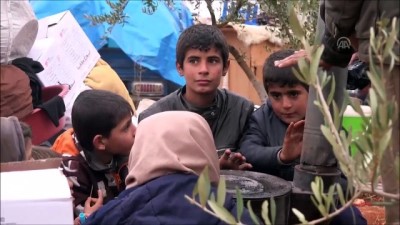 yazili aciklama - İdlib'den göç eden aileler çadırlara yerleştiriliyor Videosu