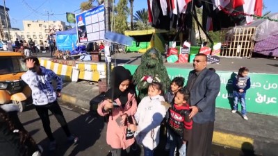 yeni yil - Bağdat'ta gösterilerin merkezi Tahrir'de yılbaşı etkinlikleri - BAĞDAT Videosu