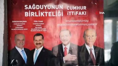  Cumhurbaşkanı Erdoğan'ın afişini söktürmeyen kadın hem tehdit edildi hem iş yeri işaretlendi 