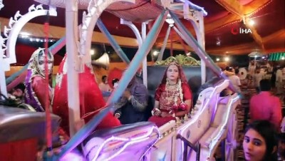  - Pakistan’da 100 çiftin evlendiği toplu düğün töreninde renkli görüntüler oluştu