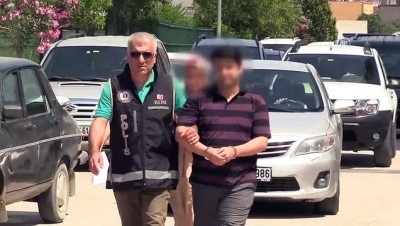 polis araci - FETÖ firarisi çift hücre evinde yakalandı - ADANA Videosu