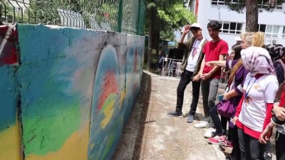 resim sanati - Okul bahçesi duvarı tuval oldu - BURDUR  Videosu