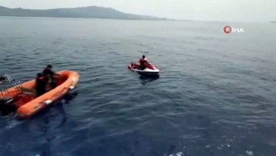 sahil guvenlik -  Jet ski'ye tutunarak Yunan adalarına kaçmaya çalışan Filistinli kaçaklar yakalandı Videosu
