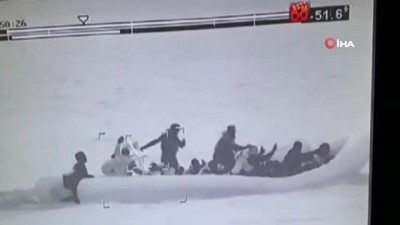 sahil guvenlik -  Lastik botla ölüm yolculuğuna çıkan 28 kaçak göçmen gece görüş kamerasıyla görüntülendi  Videosu